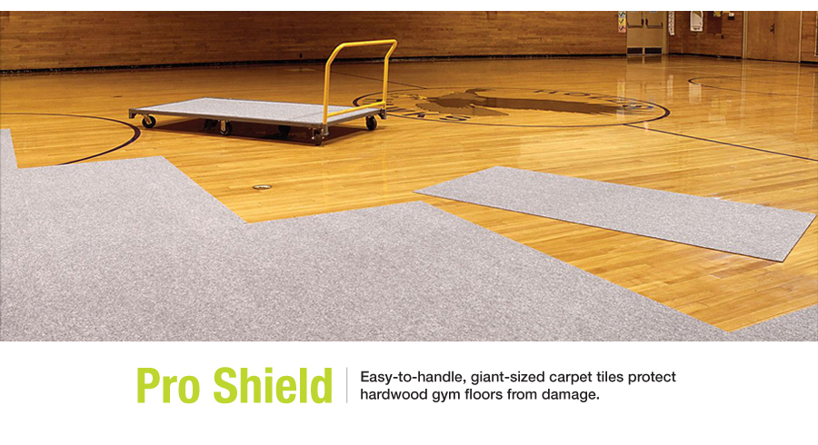 The Next Level Sports Group. Pro Shield gym floor carpet tiles. Easy-to-handle, giant-sized carpet tiles protect hardwood gym floors from damage.
